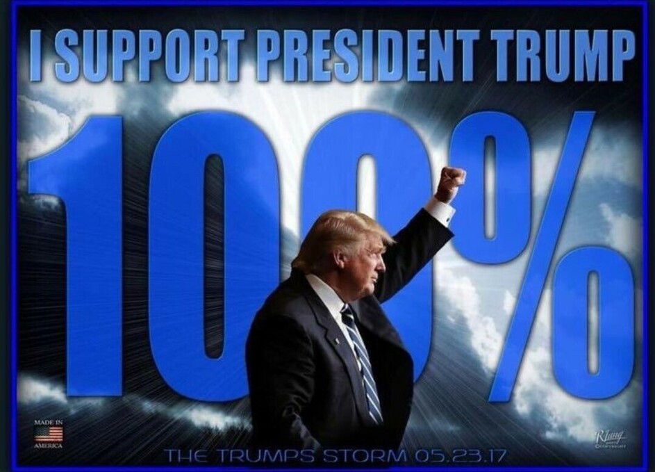 Text reads "I SUPPORT PRESIDENT TRUMP 100%", with a large "100%" in blue lettering on a dark, cloudy background. Image of Donald Trump raising his fist in the foreground. Caption below: "THE TRUMPS STORM 05.23.17". The image also includes a small American flag emblem with the text "MADE IN AMERICA" in the bottom left corner.