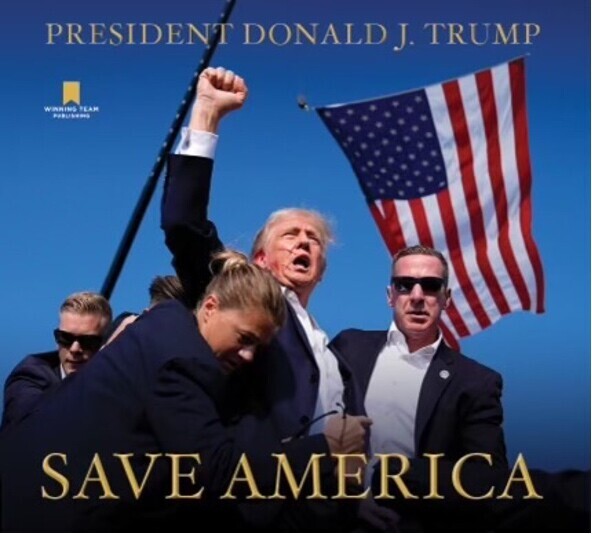 "President Donald J. Trump raising fist with American flag in background, surrounded by security, under blue sky, with 'Save America' text"