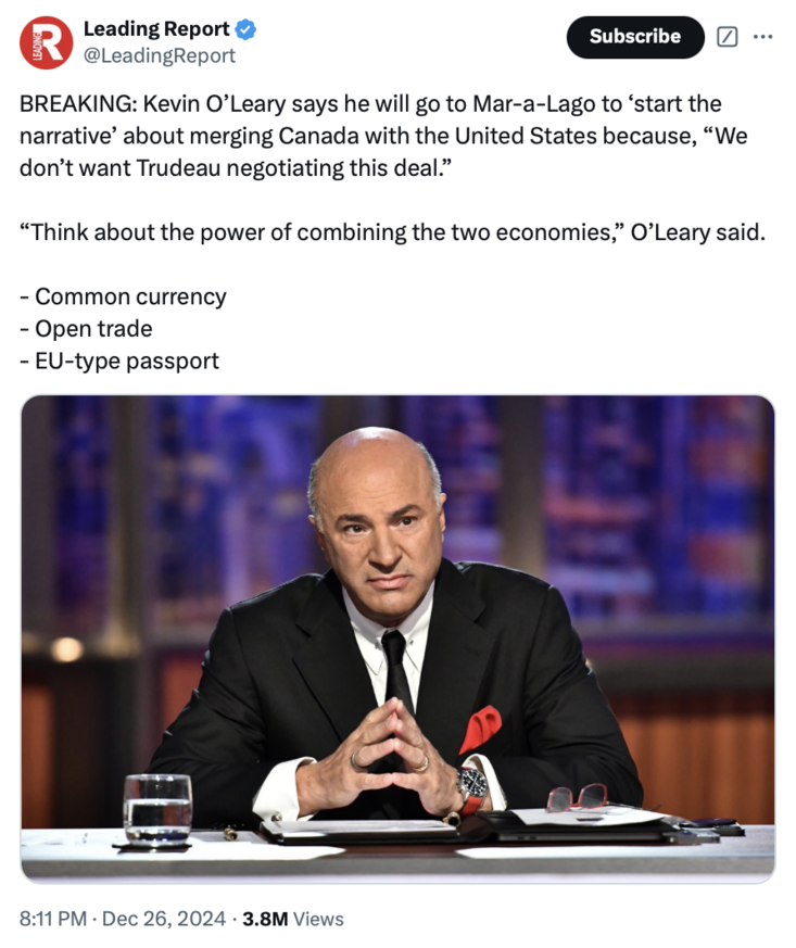 Kevin O'Leary in a formal suit, seated at a desk with papers and glasses, discussing merging Canada with the United States, common currency, open trade, and an EU-type passport according to a tweet by Leading Report.